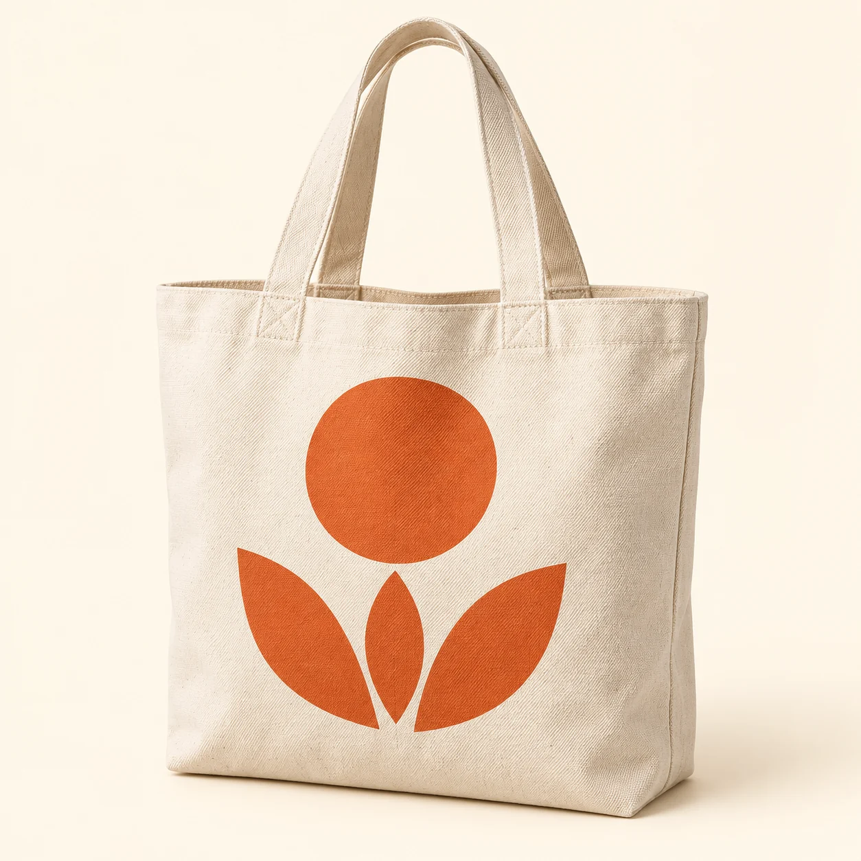 Canvas tote bag with an orange printed sun and petals
